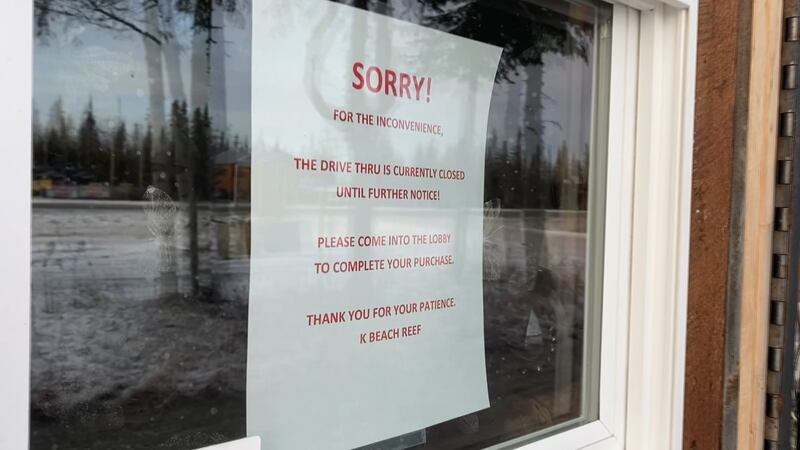 A sign on the drive-thru window of K Beach Reef in Soldotna. Owner Ryan Hall says he built the...