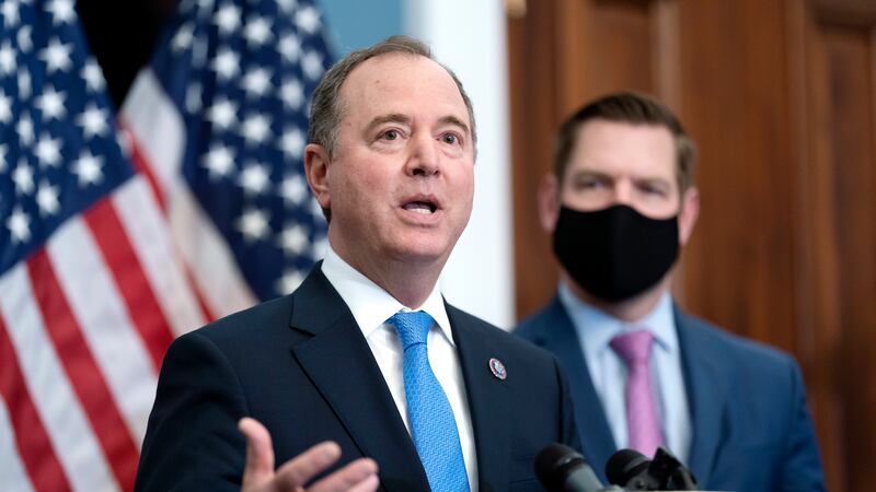 FILE - House Intelligence Committee Chairman Adam Schiff, D-Calif., left, joined by Rep. Eric...