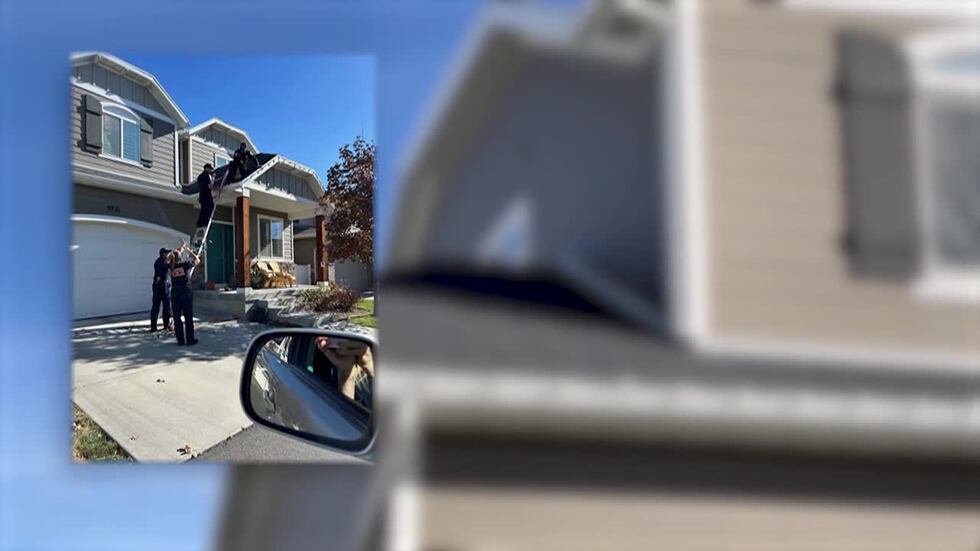 More than one neighbor took pictures of what the firefighters were doing up on the roof with...