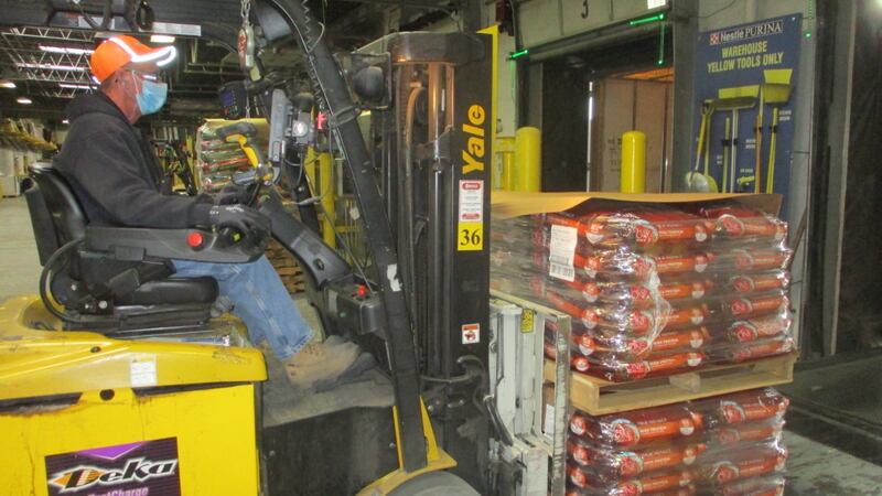A Purina donation of 39,000 pounds of dog food leaves Purina's Denver factory on its way to...