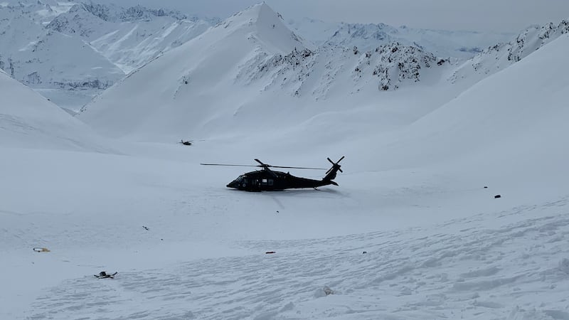 An Alaska Army National Guard helicopter near the crash site near Knik Glacier.