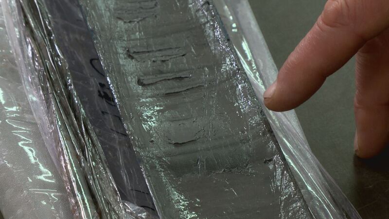 A core sample from the bottom of Eklutna Lake shows changes in sediment, occurring as a result...