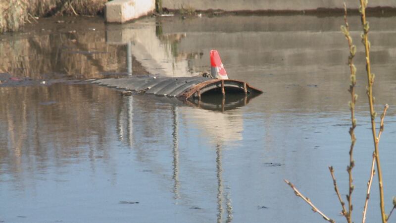 A drain at Cuddy Pond, a pooling area for water that once flowed through fish creek.
