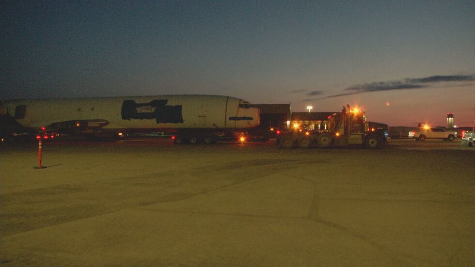 A Boeing 727 being pulled by a Carlile Transportation semi-truck departs Merrill Field on Apr. 6.