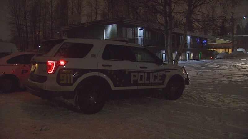 Police park outside the scene of a shooting on East 12 Avenue. Photo by KTUU Mike Nederbrock.